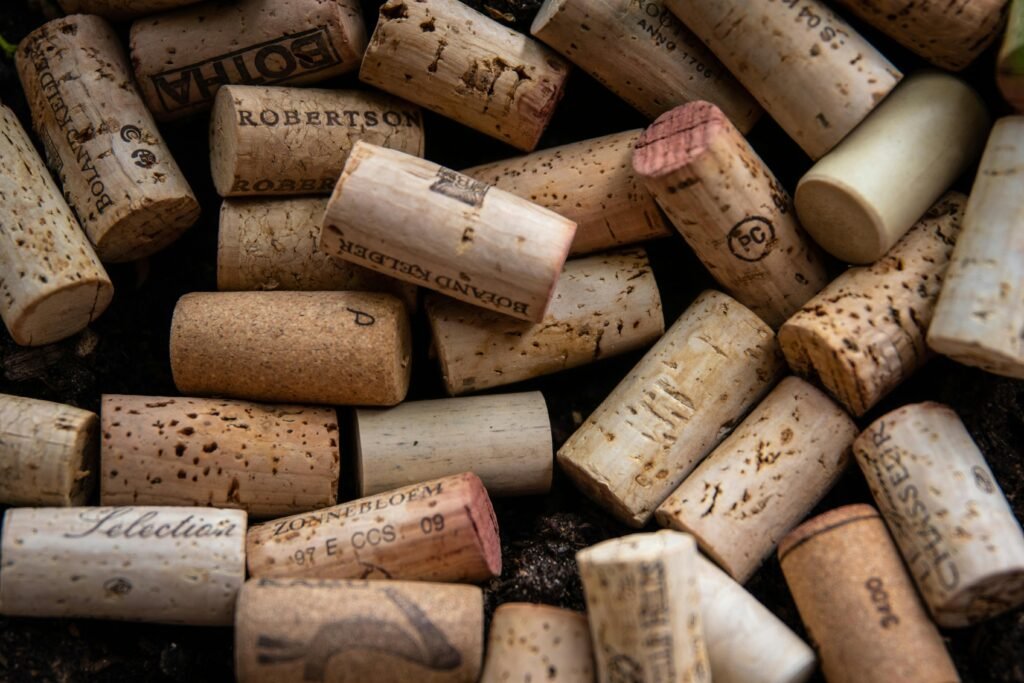 Detailed close-up of assorted wine corks showcasing texture and winery branding.